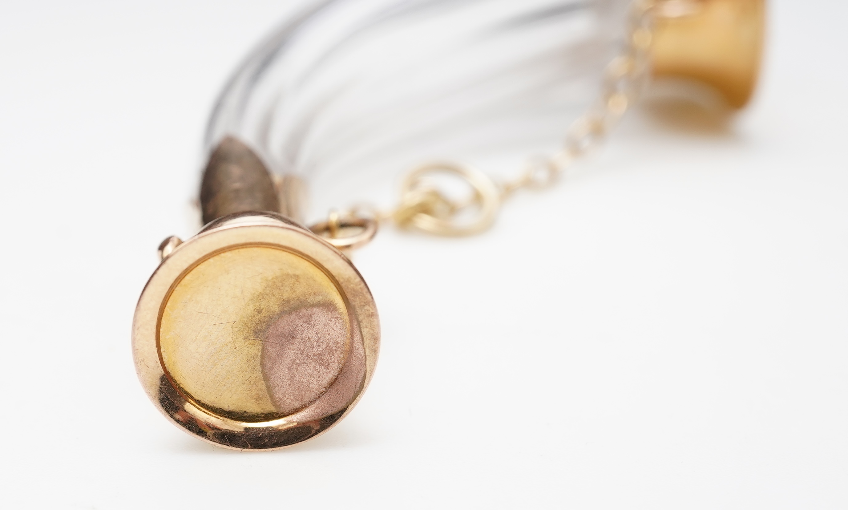 A gold and glass scent bottle, France, late 19th/early 20th century